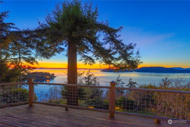 deck at dusk with a water view