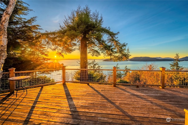 deck at dusk with a water view