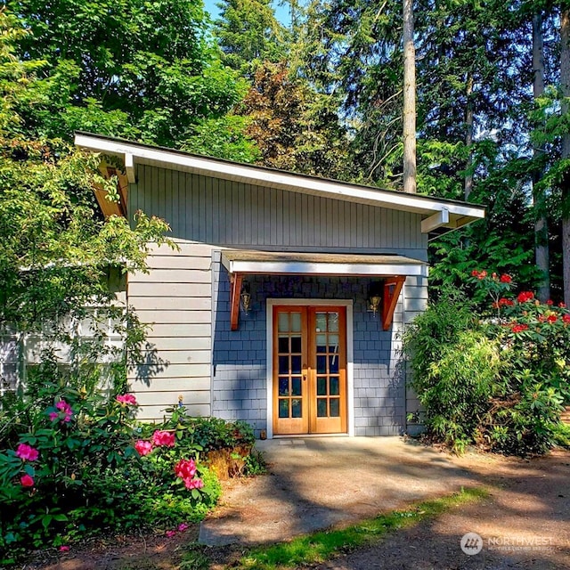 view of outdoor structure with french doors