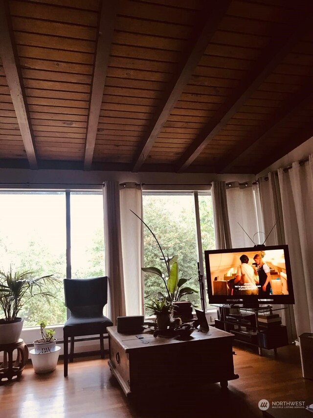 sunroom / solarium with wood ceiling and beamed ceiling