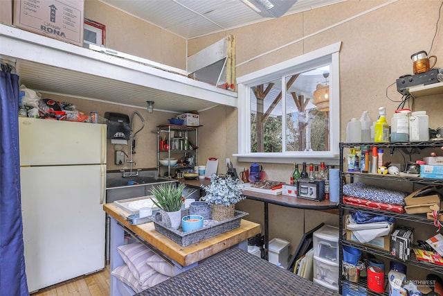 interior space featuring white fridge