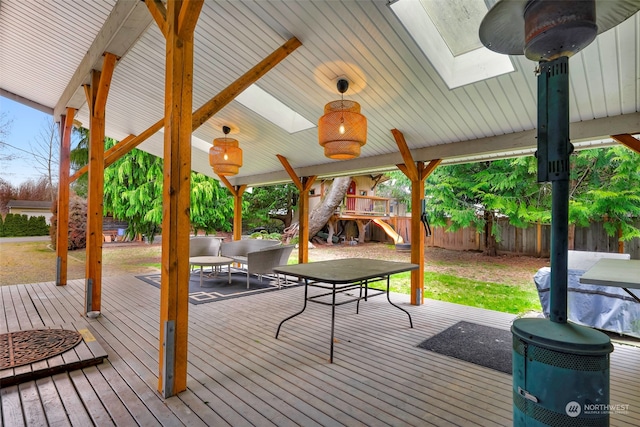 wooden terrace featuring outdoor lounge area