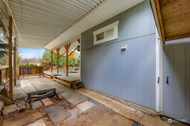 property entrance with a patio area