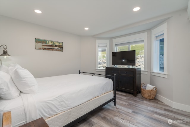 bedroom featuring light wood-type flooring