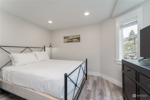 bedroom featuring light wood-type flooring