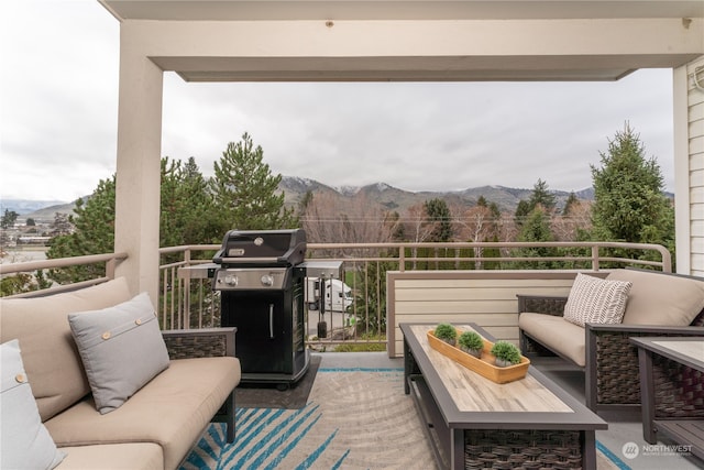 balcony with grilling area and an outdoor living space