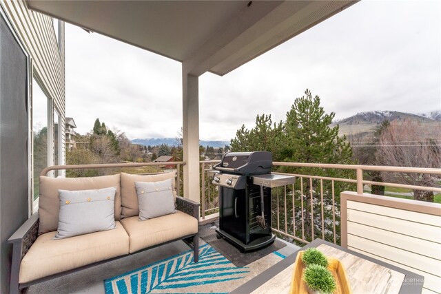 balcony featuring a grill and a mountain view