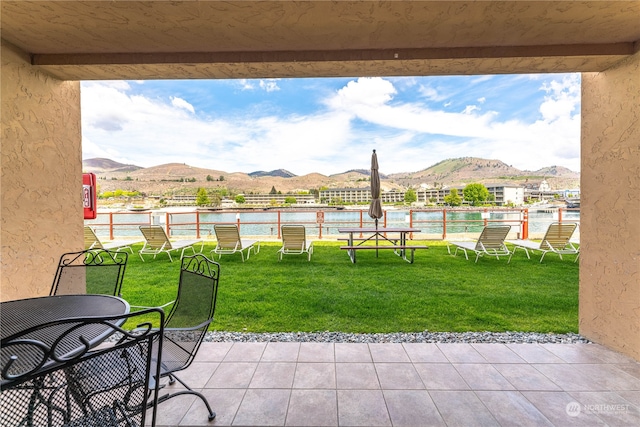 view of terrace with a mountain view