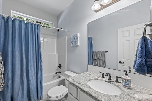 full bathroom with shower / tub combo, vanity, and toilet