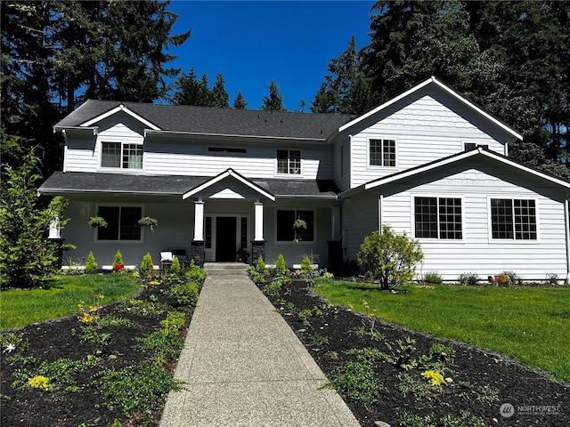 view of front of home featuring a front lawn