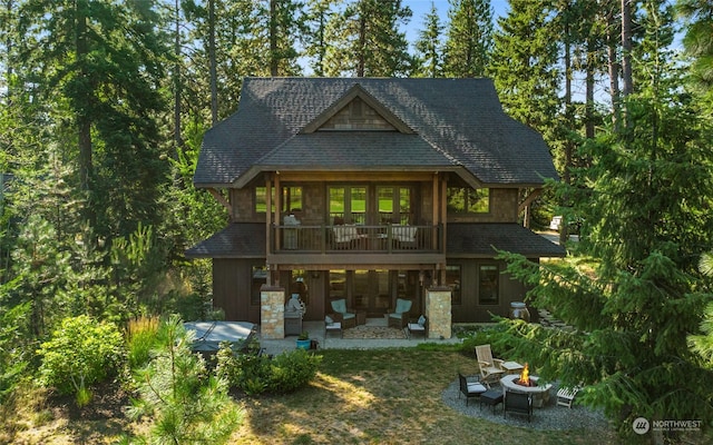 rear view of house featuring a patio area