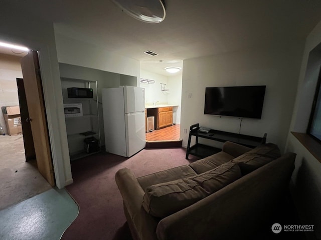 living room with carpet flooring