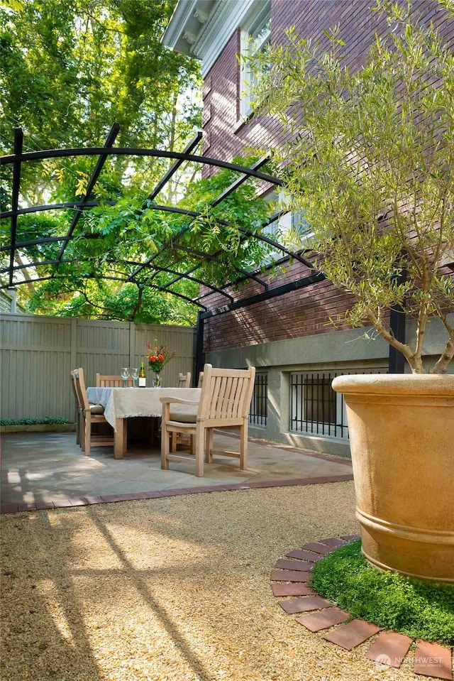 view of patio featuring a pergola