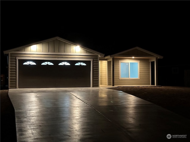 view of front of property with a garage