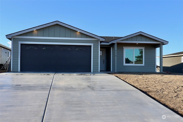 single story home with a garage