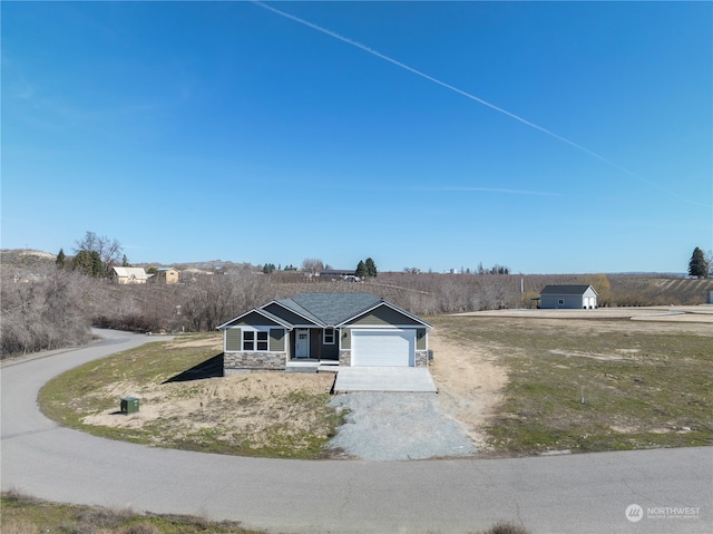 single story home with a garage