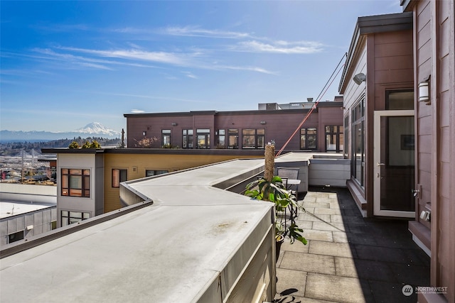 1501 Tacoma Ave S Unit 603, Tacoma, WA 98402 - view of patio / terrace with a mountain view and a balcony
