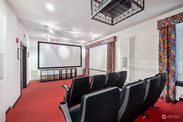 1501 Tacoma Ave S Unit 603, Tacoma, WA 98402 - carpeted home theater room featuring track lighting and baseboards