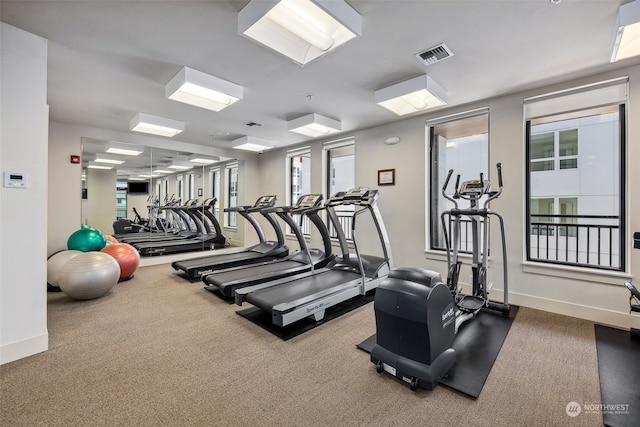 1501 Tacoma Ave S Unit 603, Tacoma, WA 98402 - exercise room featuring baseboards