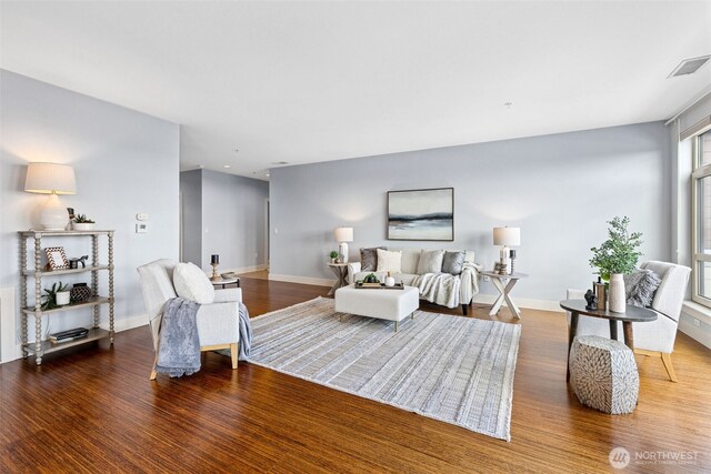 1501 Tacoma Ave S Unit 603, Tacoma, WA 98402 - living room featuring wood finished floors and baseboards
