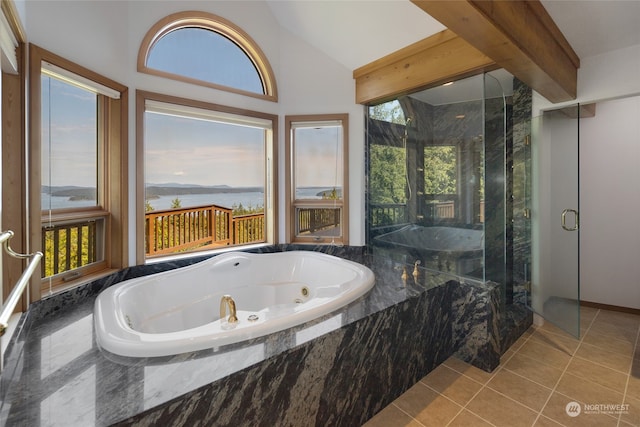 bathroom featuring lofted ceiling, a water view, tile floors, and shower with separate bathtub