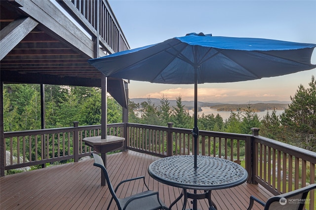 deck at dusk with a water view