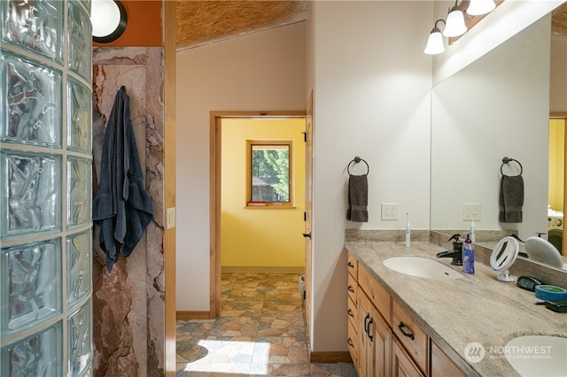 bathroom featuring tile floors and vanity