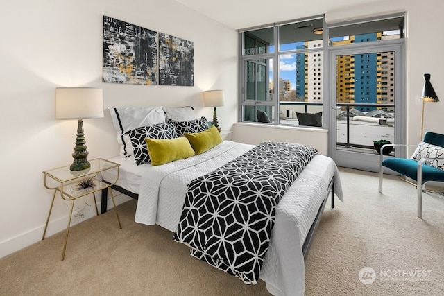 bedroom featuring light colored carpet