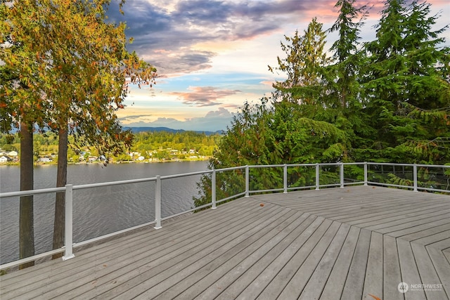 deck at dusk with a water view