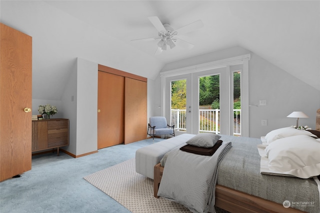 bedroom featuring light carpet, ceiling fan, a closet, lofted ceiling, and access to outside