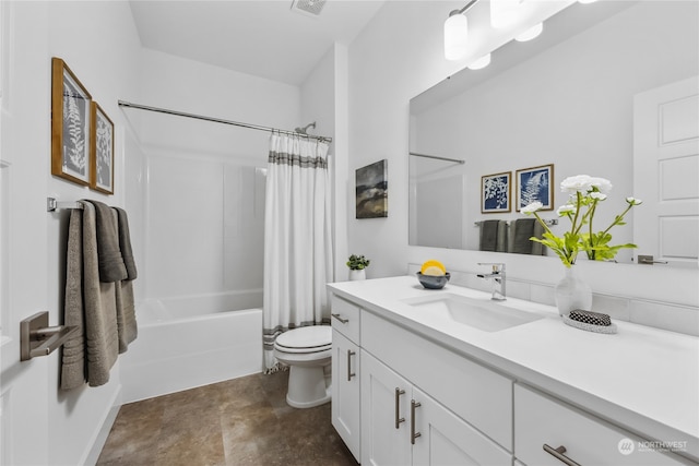 full bathroom with shower / bath combo, vanity, and toilet