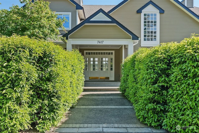 entrance to property featuring french doors