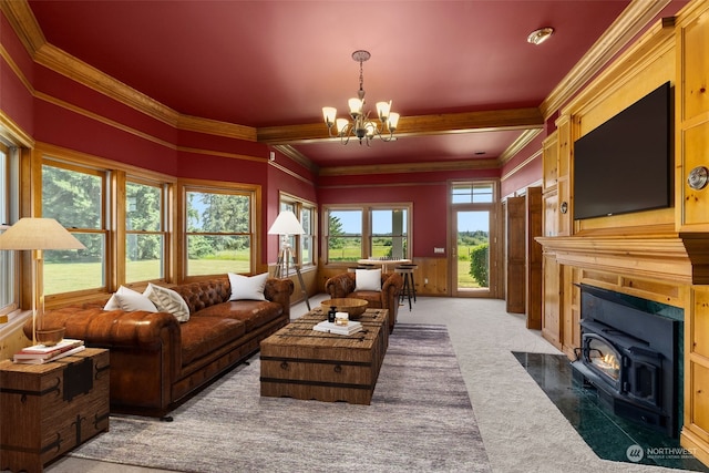 living room featuring an inviting chandelier, a wood stove, dark colored carpet, beam ceiling, and ornamental molding