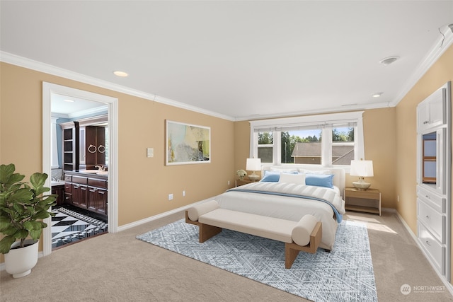 bedroom featuring crown molding, sink, and light colored carpet