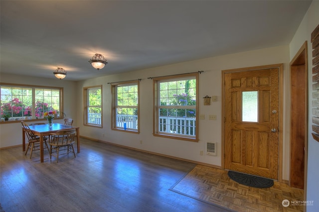 foyer with dark wood-type flooring