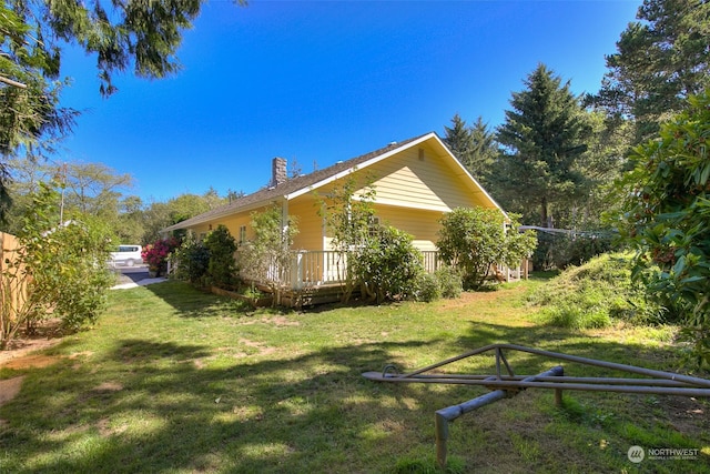 view of home's exterior featuring a lawn