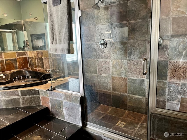 bathroom with a shower with shower door