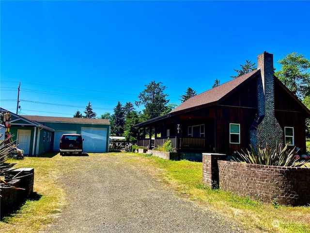 view of side of home with a porch