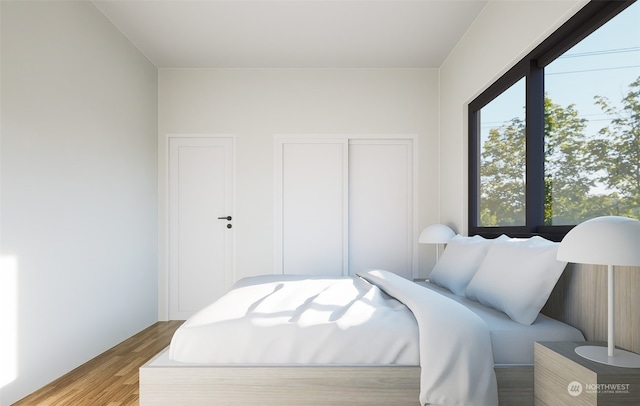 bedroom featuring light hardwood / wood-style flooring