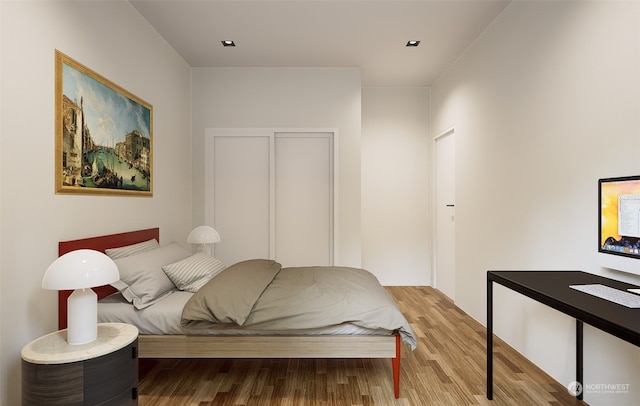 bedroom with light hardwood / wood-style floors