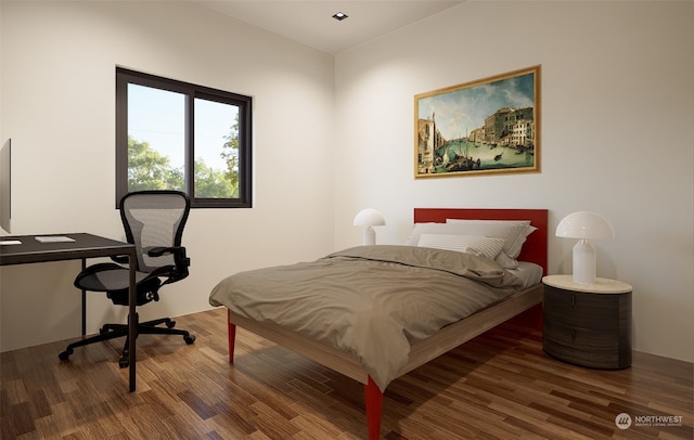 bedroom featuring dark hardwood / wood-style flooring