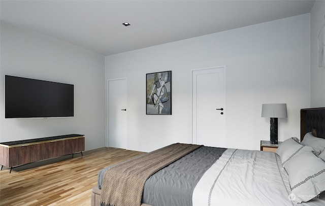 bedroom featuring light hardwood / wood-style flooring