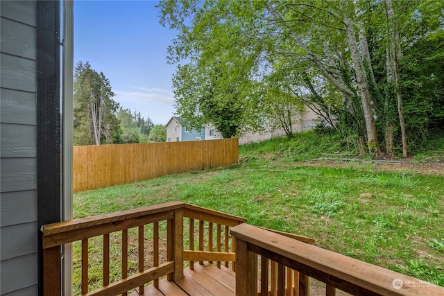 view of yard with a wooden deck