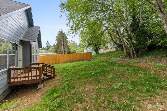 view of yard featuring a deck