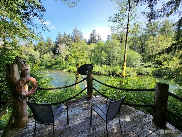 view of patio featuring a water view