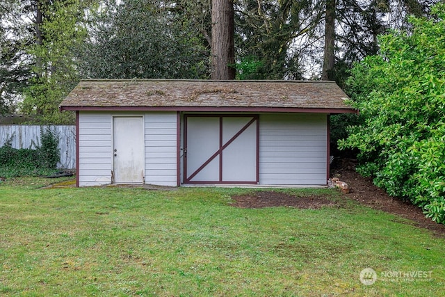 view of outdoor structure featuring a yard