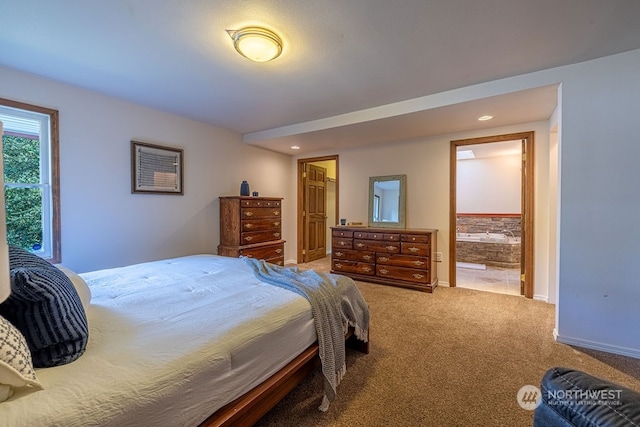 carpeted bedroom with connected bathroom