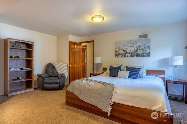 bedroom featuring light carpet