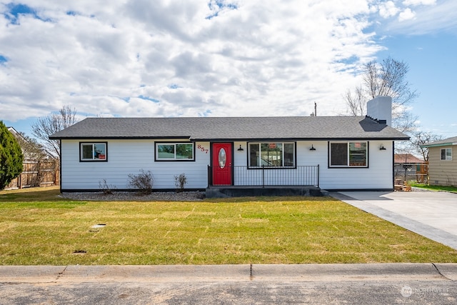 single story home featuring a front yard