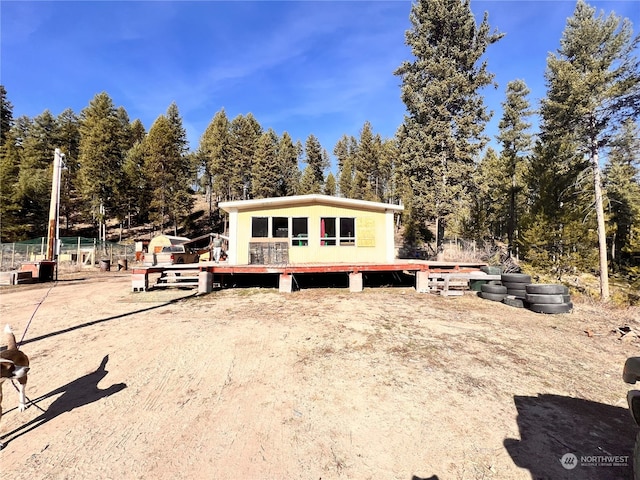 view of front of home with a deck